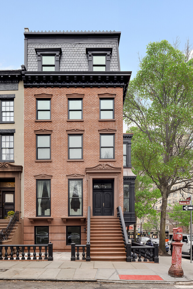 1 Monroe Place Brooklyn, NY 11201 - Photo 30 of 31 a street sign on a pole on a street