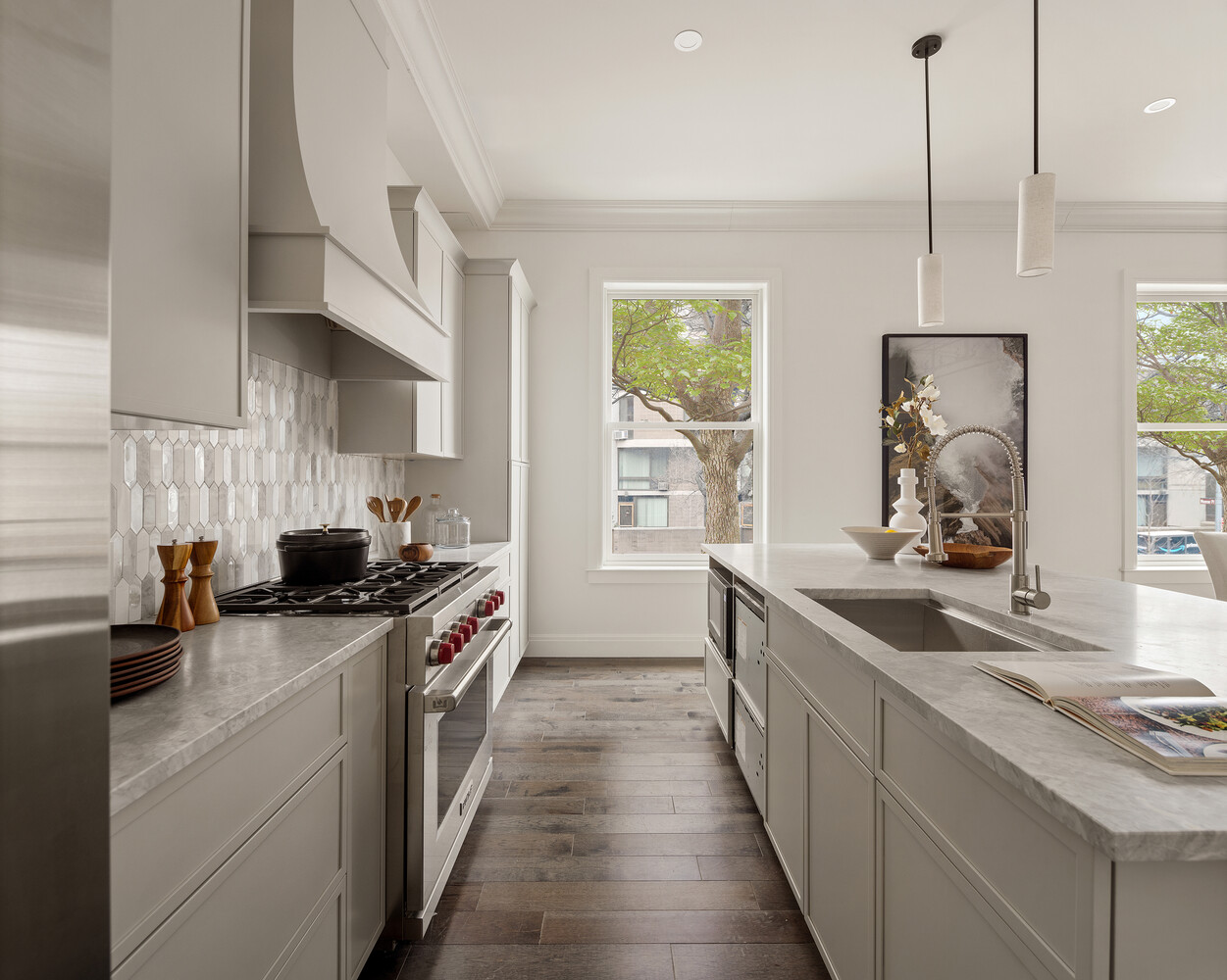 1 Monroe Place Brooklyn, NY 11201 - Photo 4 of 31 a kitchen with a sink stove and cabinets