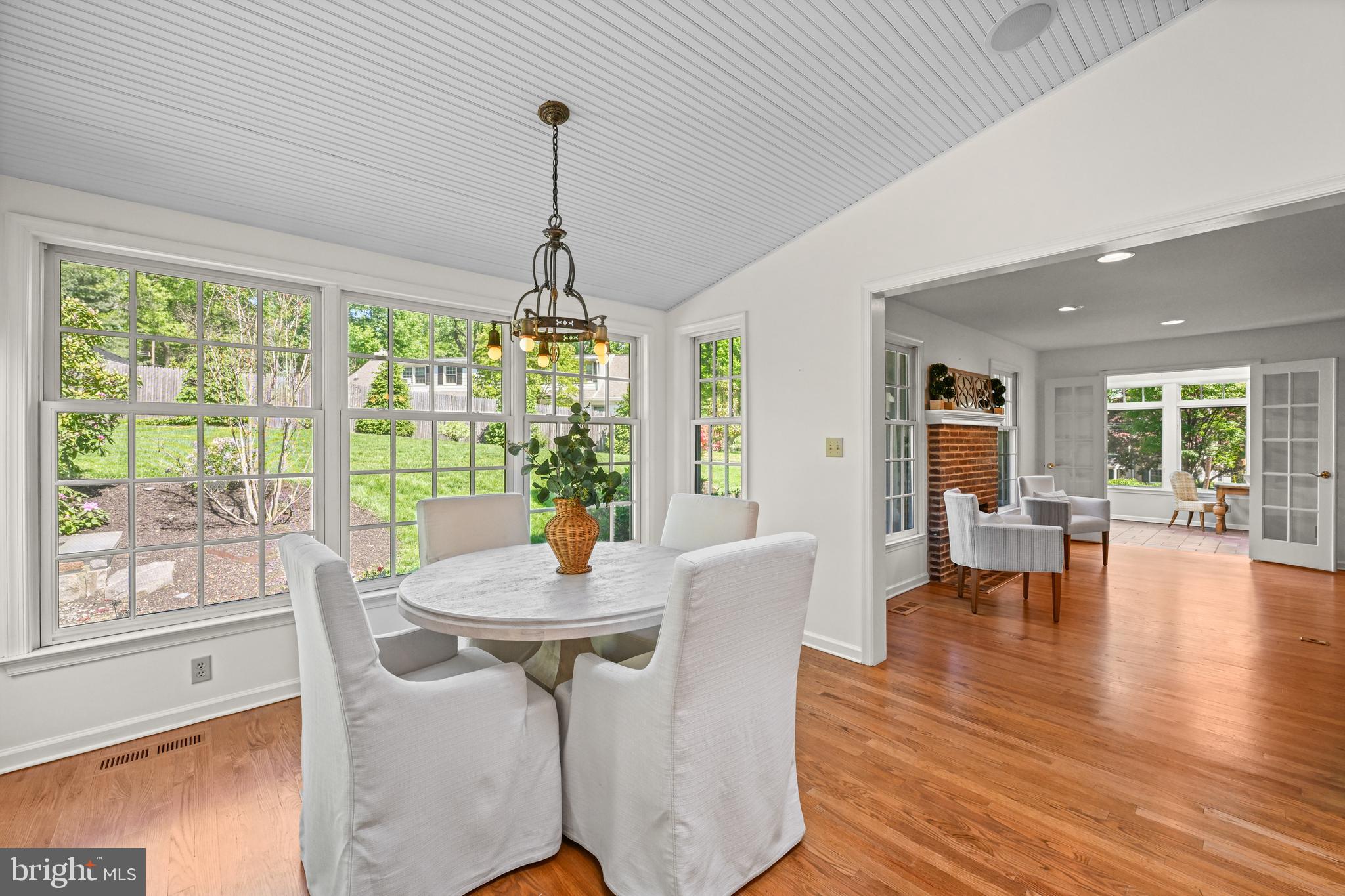 977 Ivycroft Road Wayne, PA 19087 - Photo 13 of 38 a view of a dining room with furniture window and wooden floor