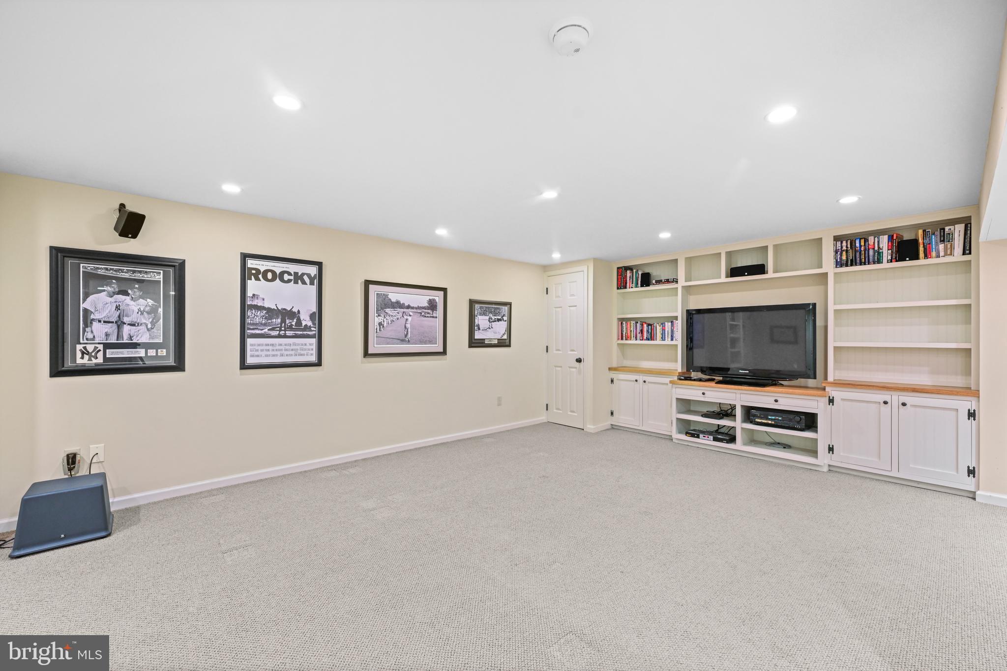 977 Ivycroft Road Wayne, PA 19087 - Photo 22 of 38 a view of a livingroom with furniture and a flat screen tv
