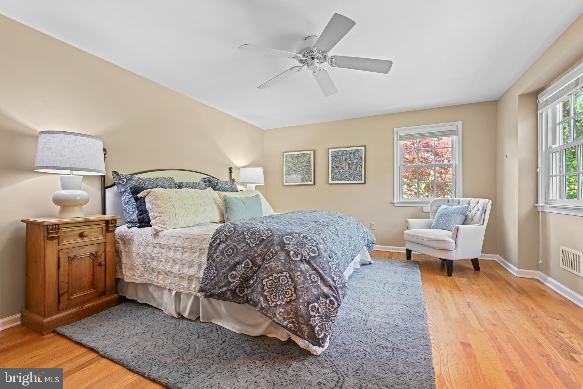 977 Ivycroft Road Wayne, PA 19087 - Photo 25 of 38 a bedroom with a bed and wooden floor
