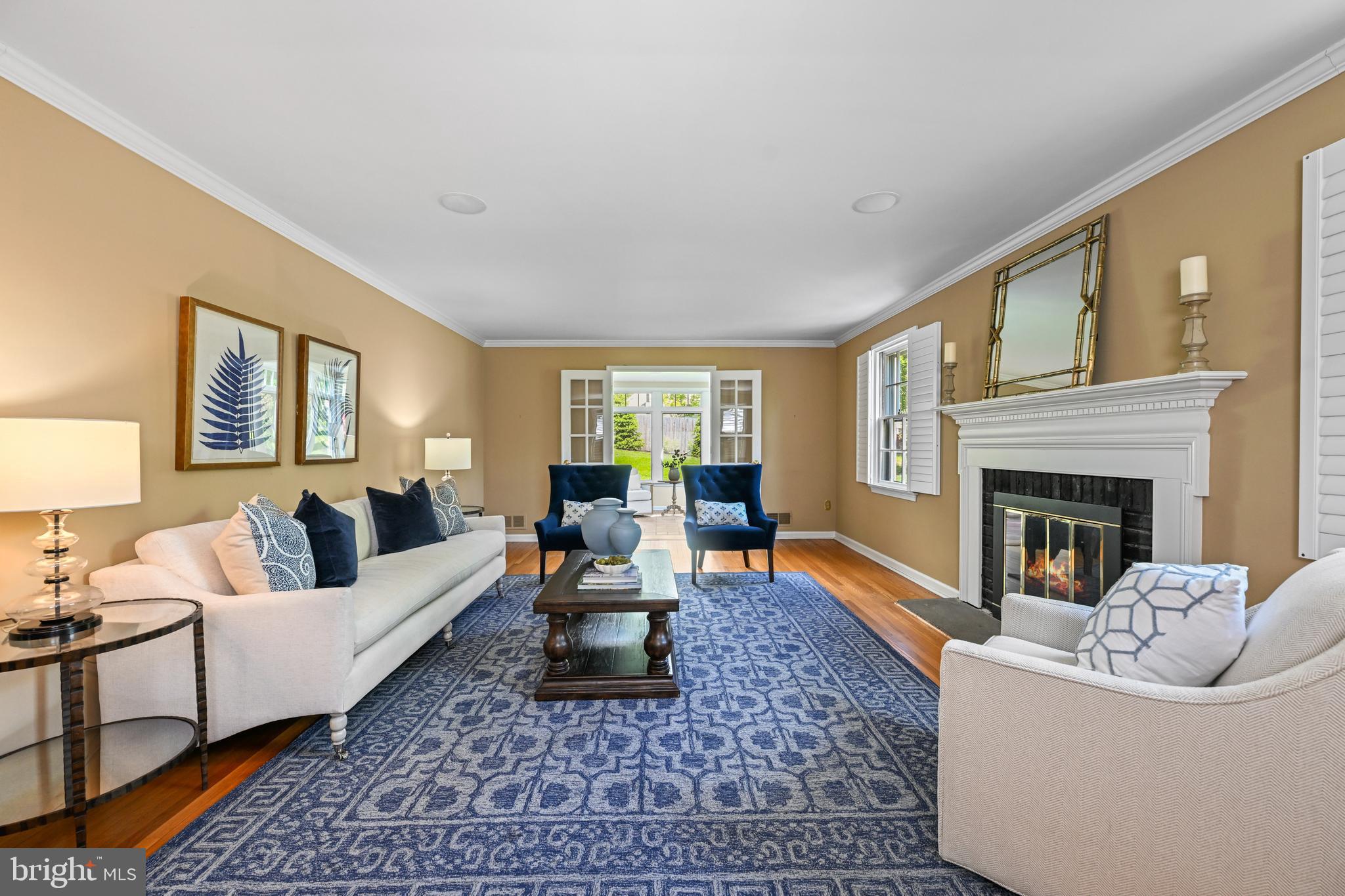 977 Ivycroft Road Wayne, PA 19087 - Photo 5 of 38 a living room with furniture and a fireplace