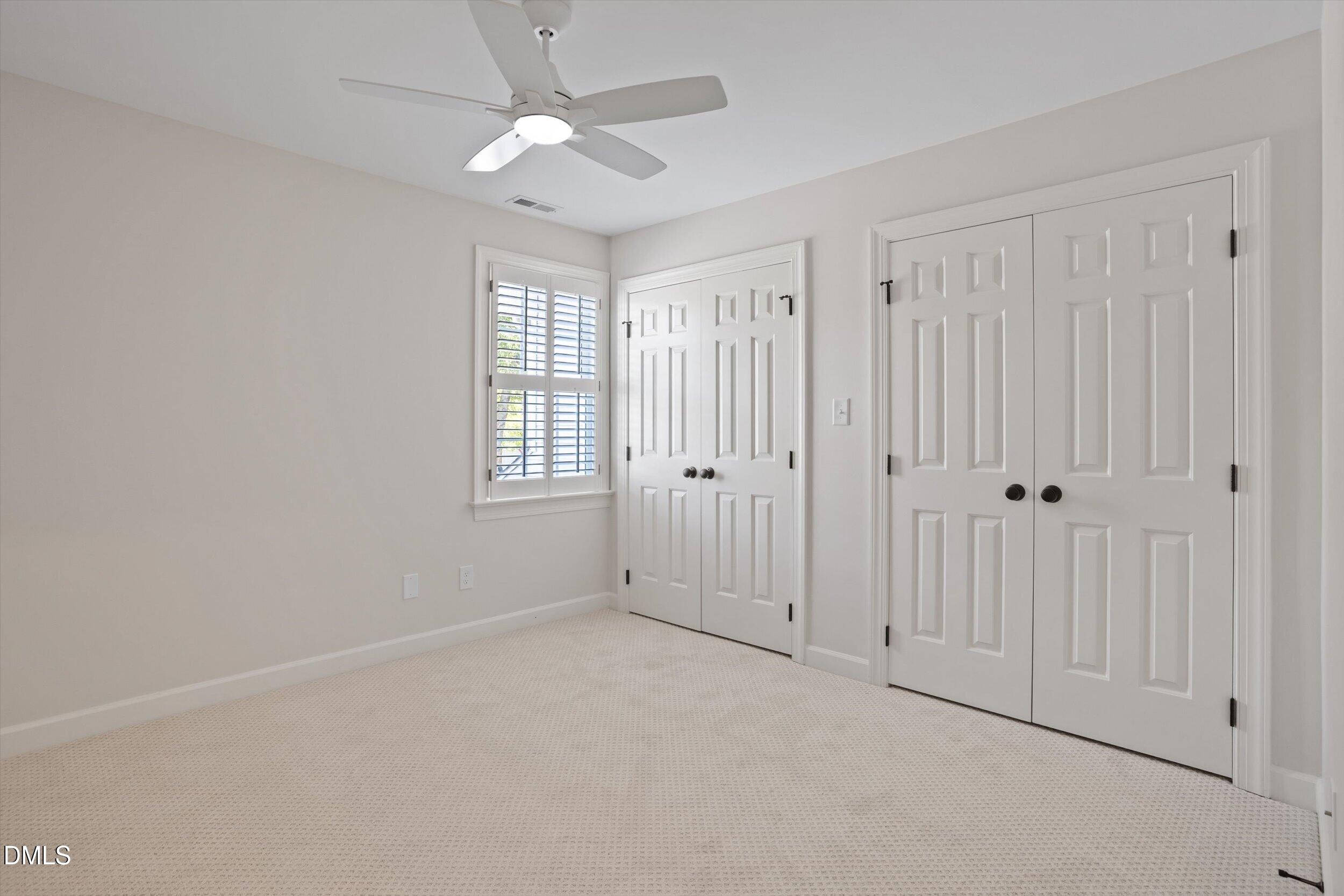 3417 Sir Colleton Court Raleigh, NC 27612 - Photo 33 of 46 Second upstairs bedroom with 2 closets