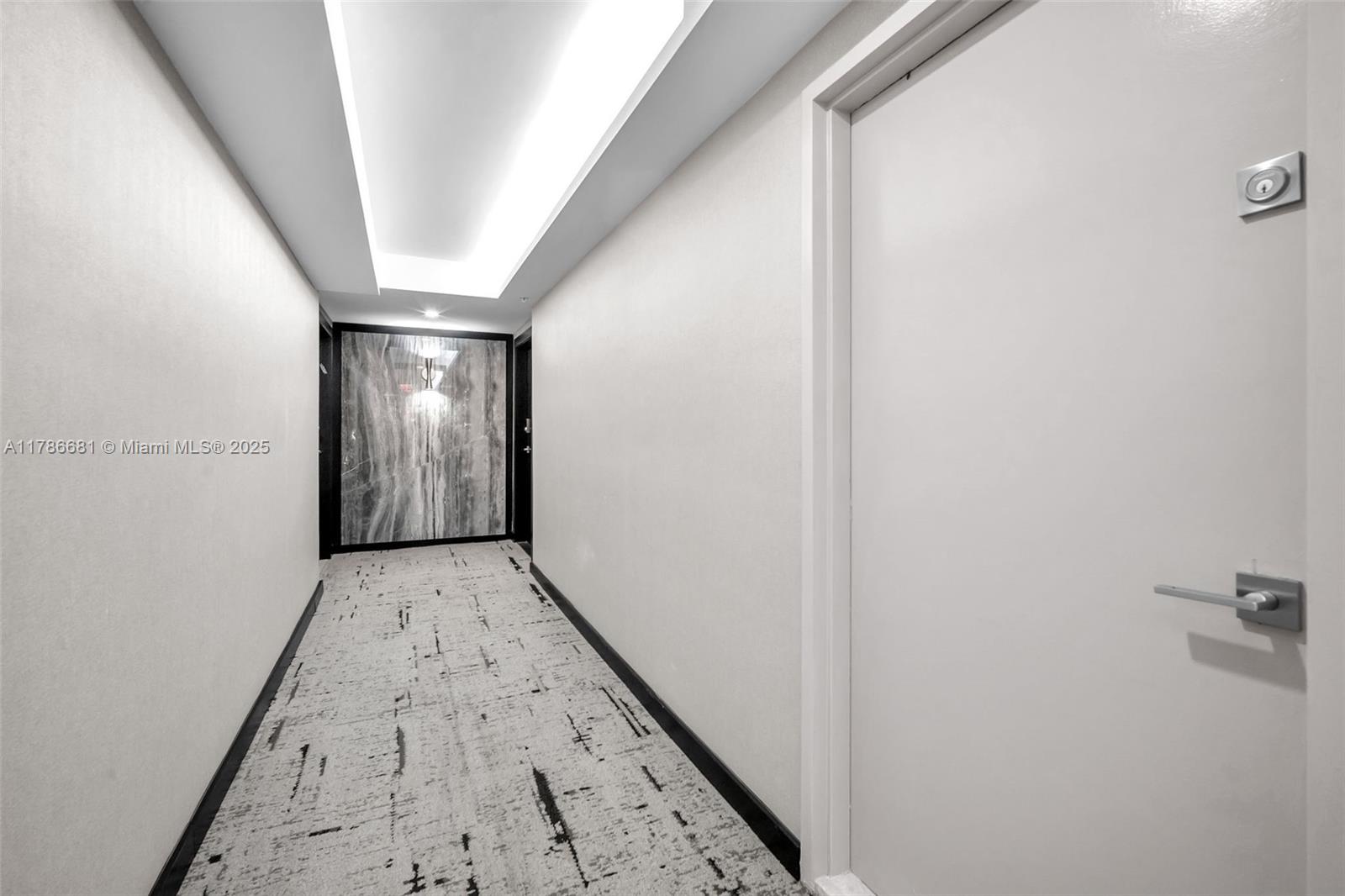11 Island Avenue, Unit 512 Miami Beach, FL 33139 - Photo 22 of 54 a view of hallway with wooden floor