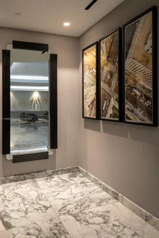 a living room with furniture a rug and a window