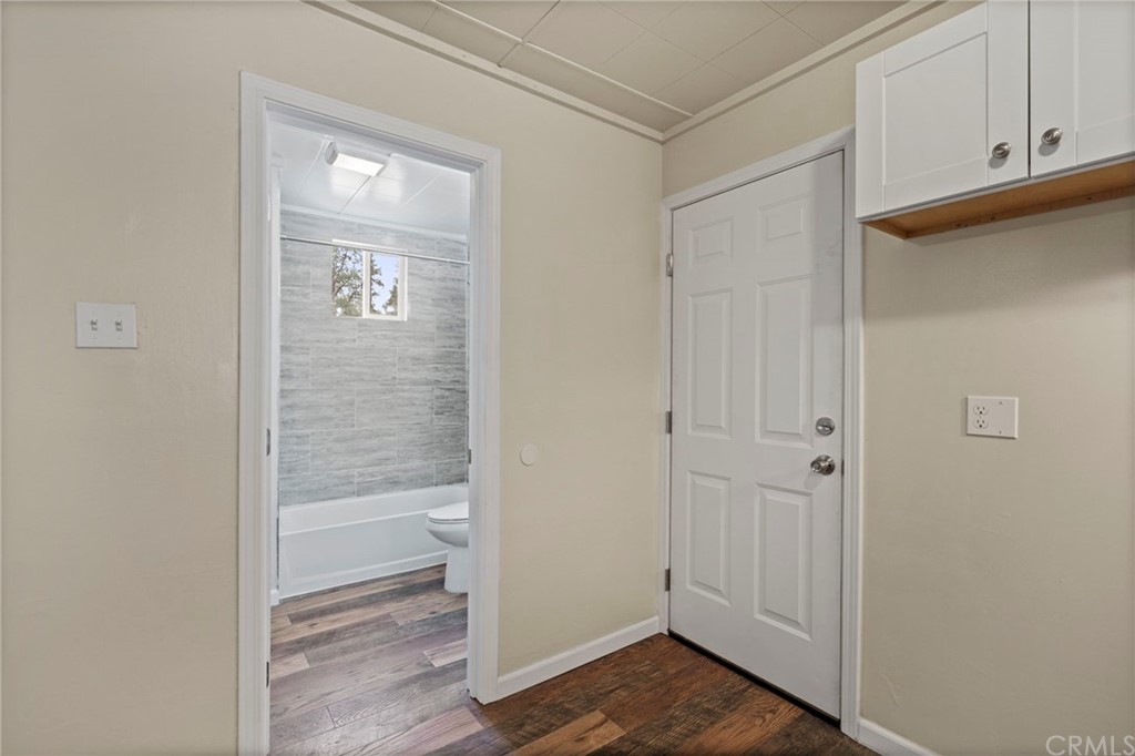 6436 Old Highway 53 Clearlake, CA 95422 - Photo 23 of 27 a view of a bathroom with wooden floor