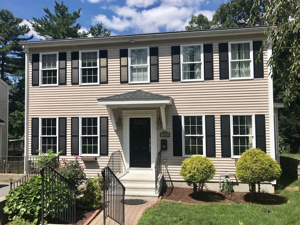 179 Florence Road Waltham, MA 02453 - Photo 1 of 37 a view of a house with a yard and sitting area