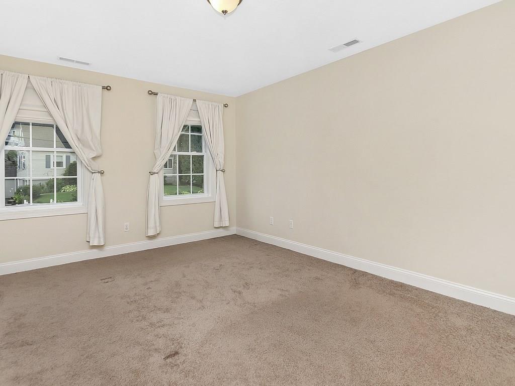 179 Florence Road Waltham, MA 02453 - Photo 18 of 37 an empty room with windows