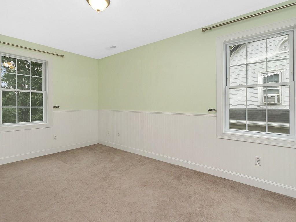 179 Florence Road Waltham, MA 02453 - Photo 19 of 37 an empty room with a window