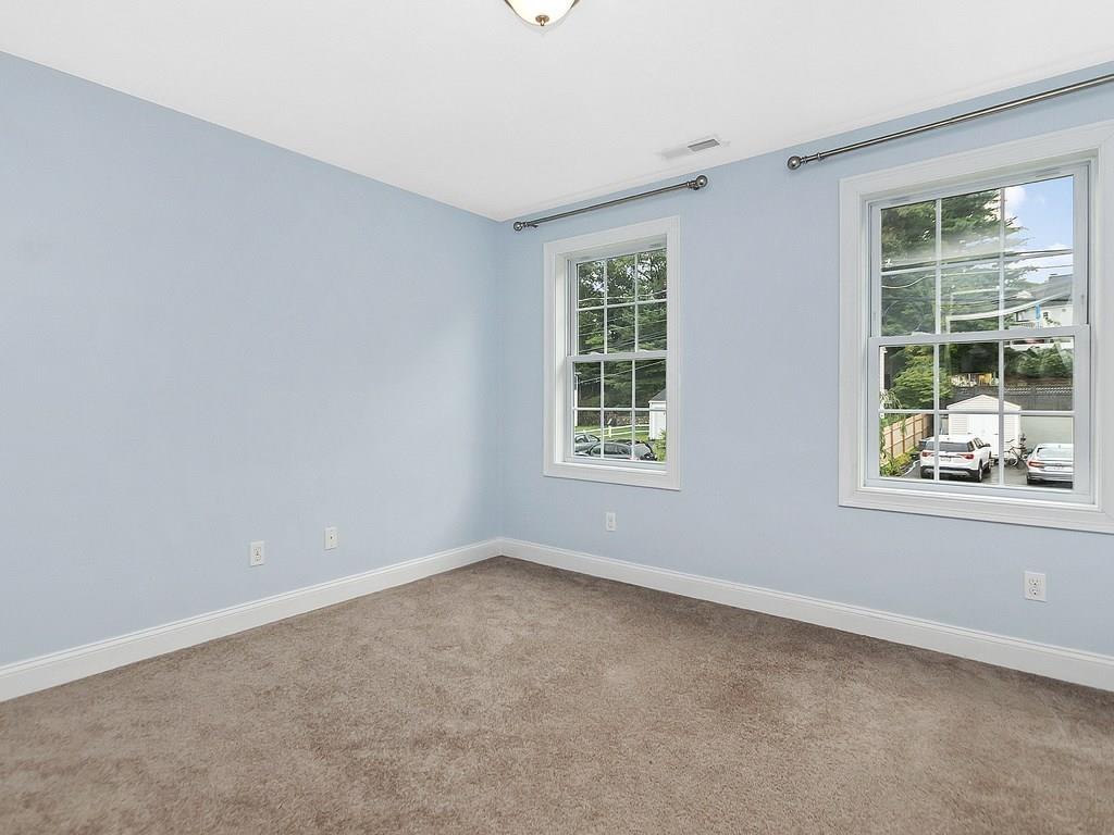 179 Florence Road Waltham, MA 02453 - Photo 20 of 37 an empty room with windows