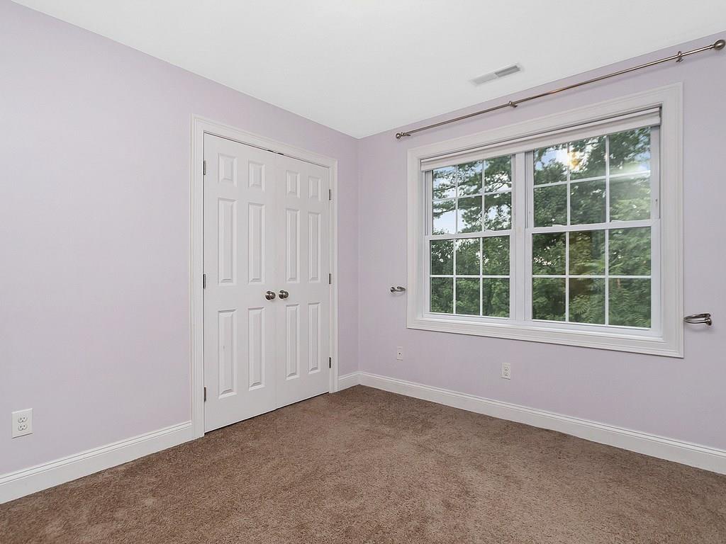 179 Florence Road Waltham, MA 02453 - Photo 21 of 37 an empty room with a window