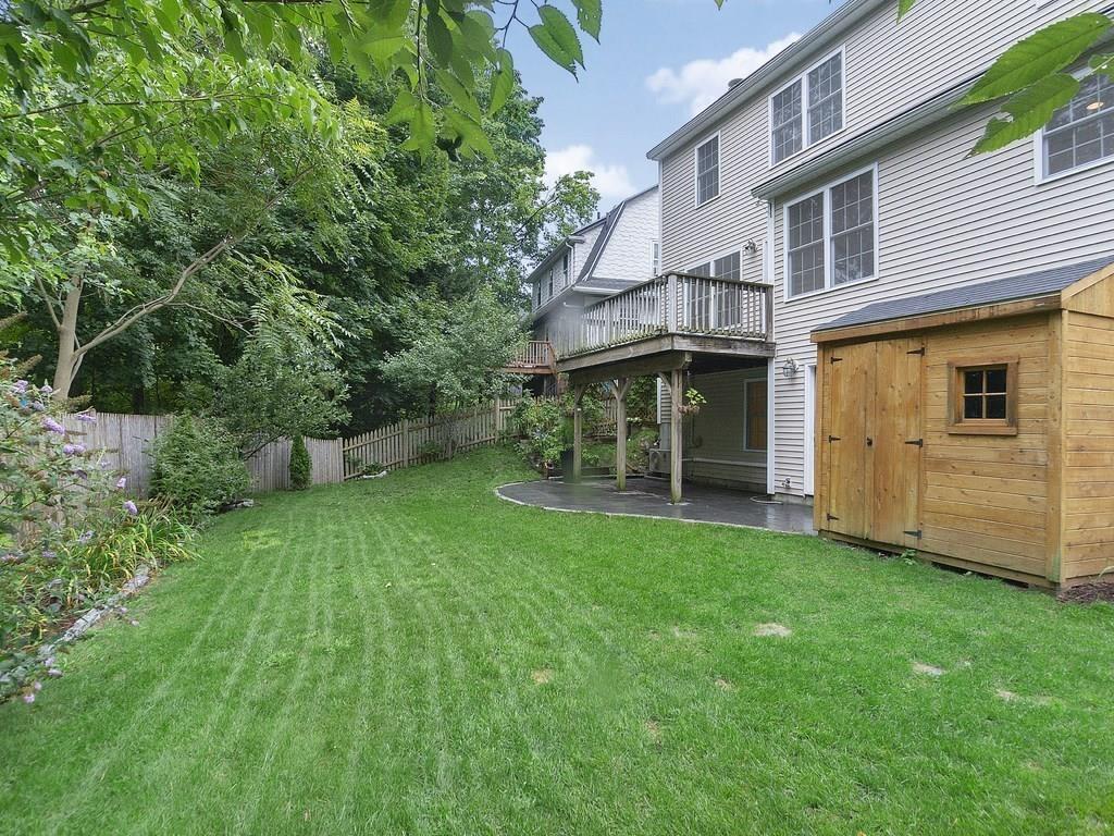 179 Florence Road Waltham, MA 02453 - Photo 31 of 37 a view of a back yard of the house