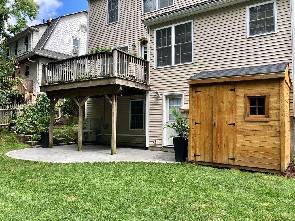 179 Florence Road Waltham, MA 02453 - Photo 32 of 37 a front view of a house with garden