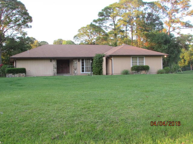 8720 Hidden Pines Road Fort Pierce, FL 34945 - Photo 1 of 31 1 front