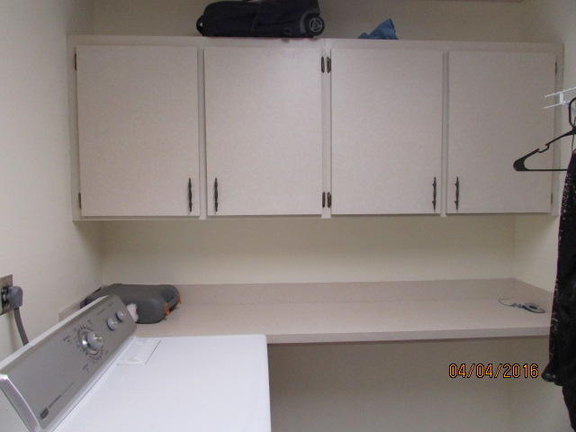 8720 Hidden Pines Road Fort Pierce, FL 34945 - Photo 20 of 31 20 laundry room