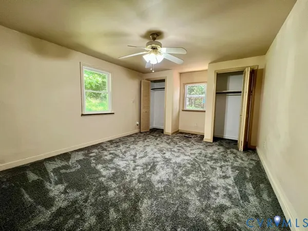 a bathroom with a shower and a sink