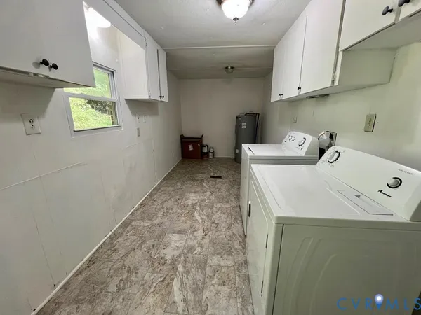 a view of a house with porch and wooden floor