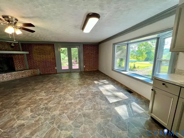 a view of a room with natural light