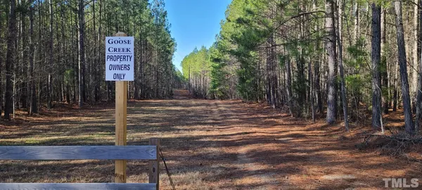 a view of a bathroom from a hallway