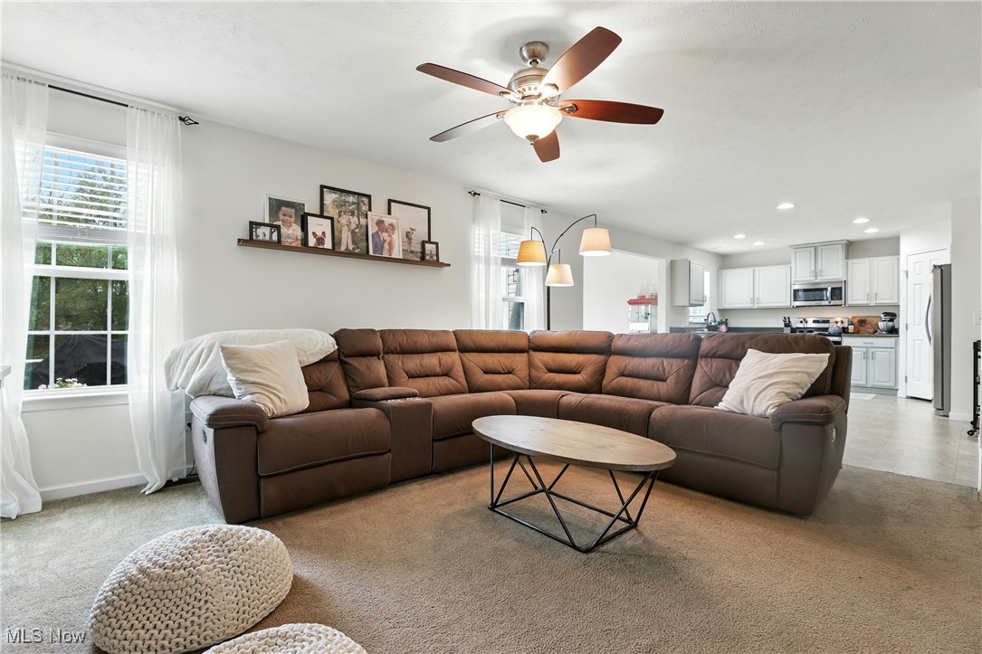 2112 Fowl Road Elyria, OH 44035 - Photo 9 of 49 Living area featuring ceiling fan, recessed lighting, and light colored carpet
