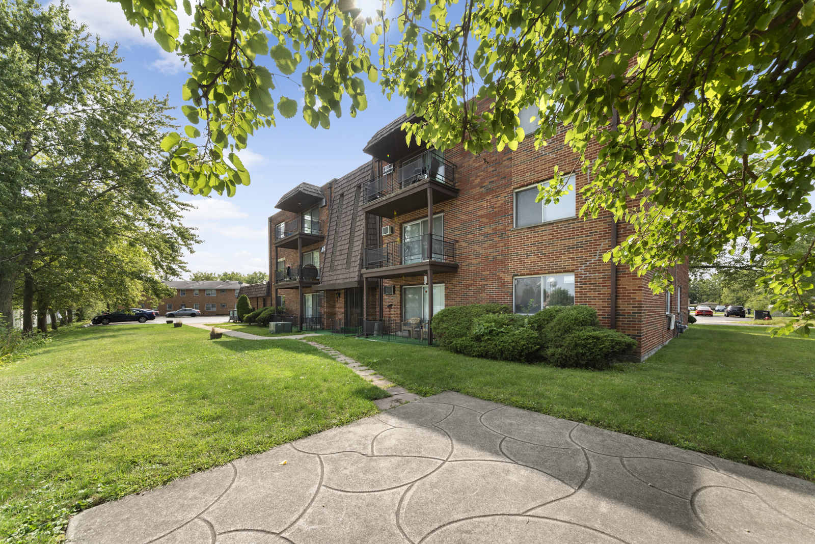 903 Elder Road, Unit 6 Homewood, IL 60430 - Photo 11 of 12 a front view of a house with a yard