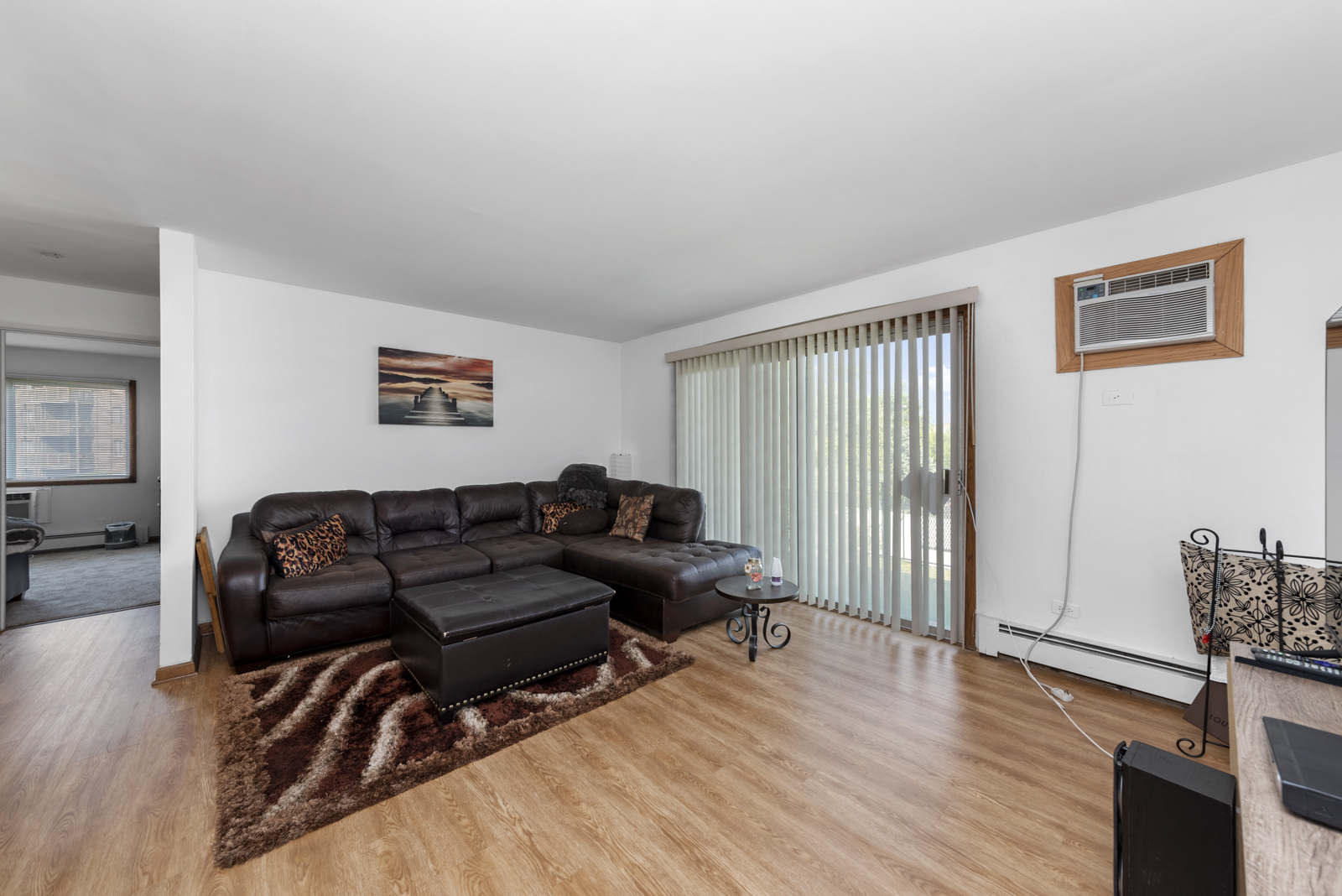 903 Elder Road, Unit 6 Homewood, IL 60430 - Photo 4 of 12 a living room with furniture and wooden floor