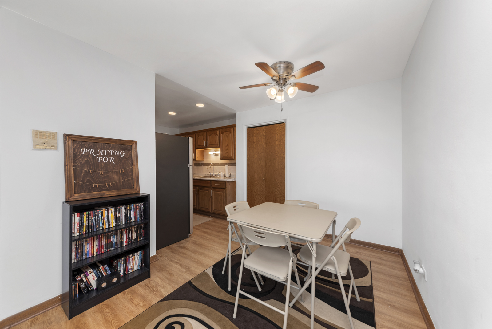 903 Elder Road, Unit 6 Homewood, IL 60430 - Photo 5 of 12 a view of a dining room with furniture and wooden floor