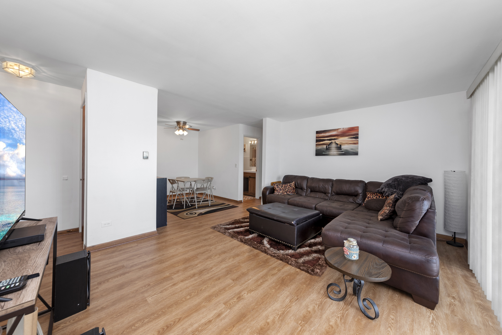 903 Elder Road, Unit 6 Homewood, IL 60430 - Photo 6 of 12 a living room with furniture and a wooden floor