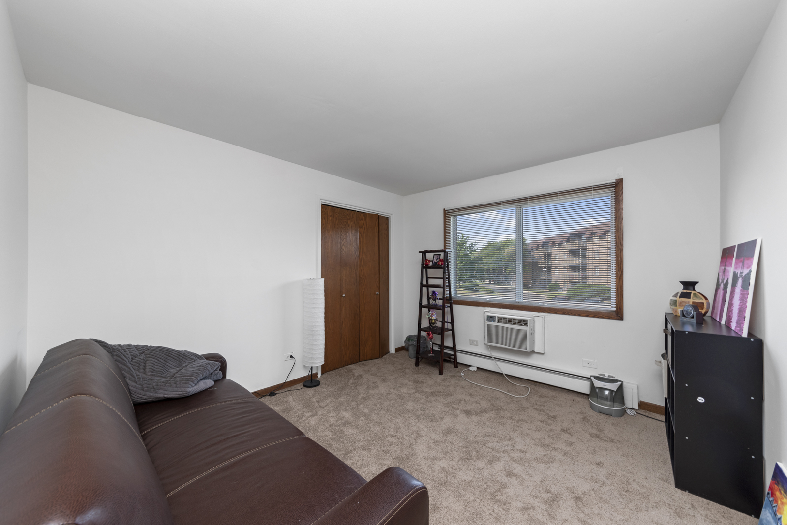 903 Elder Road, Unit 6 Homewood, IL 60430 - Photo 7 of 12 a living room with furniture and a window