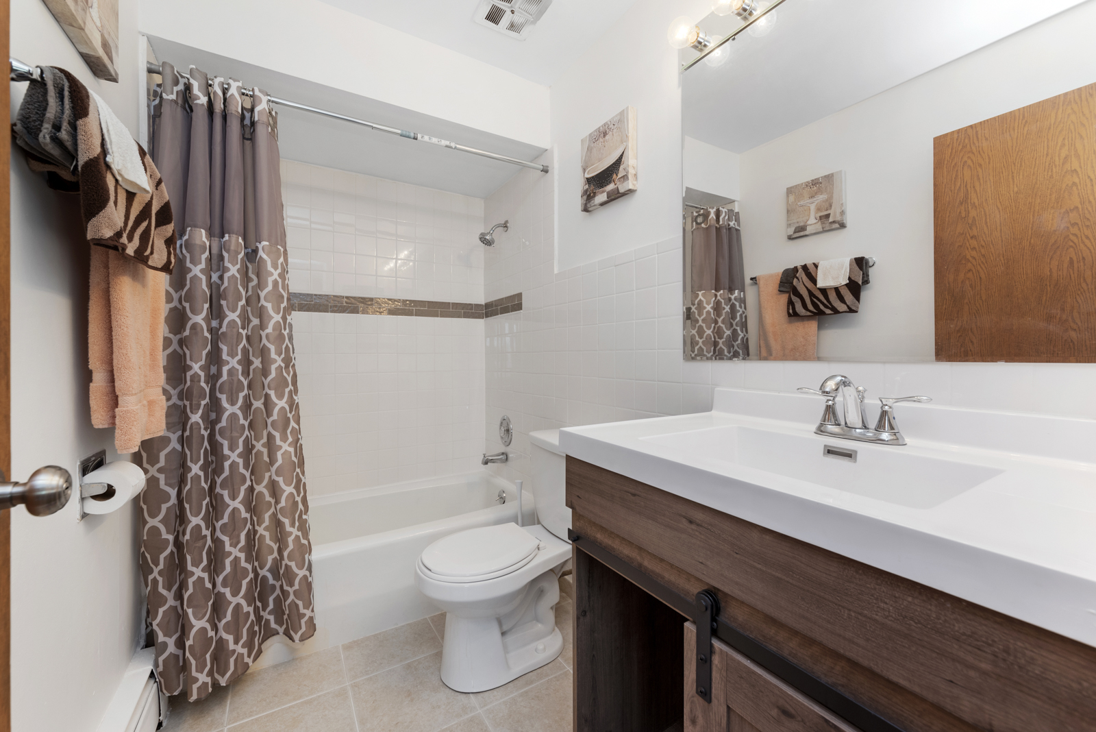 903 Elder Road, Unit 6 Homewood, IL 60430 - Photo 9 of 12 a bathroom with a sink toilet and shower