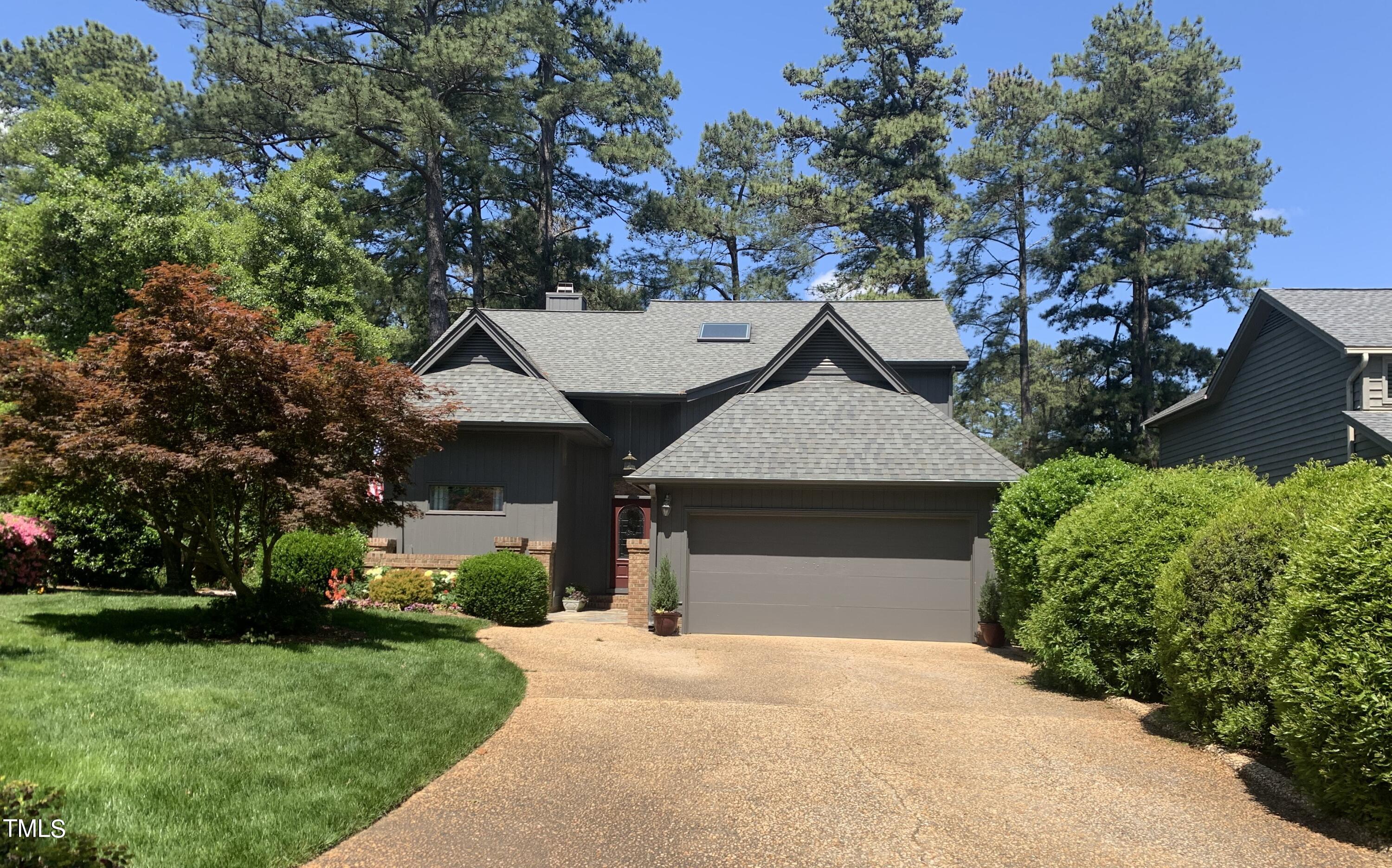 2924 Ballybunion Way Raleigh, NC 27613 - Photo 1 of 54 a front view of a house with a yard and garage