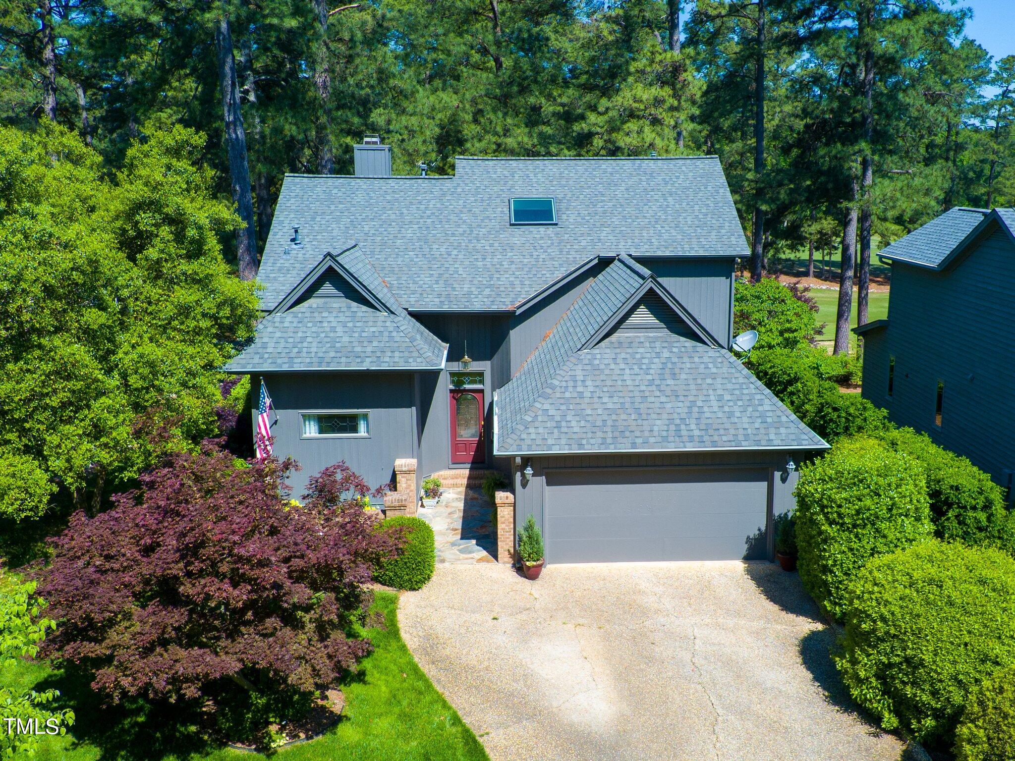 2924 Ballybunion Way Raleigh, NC 27613 - Photo 3 of 54 front view of a house with a yard