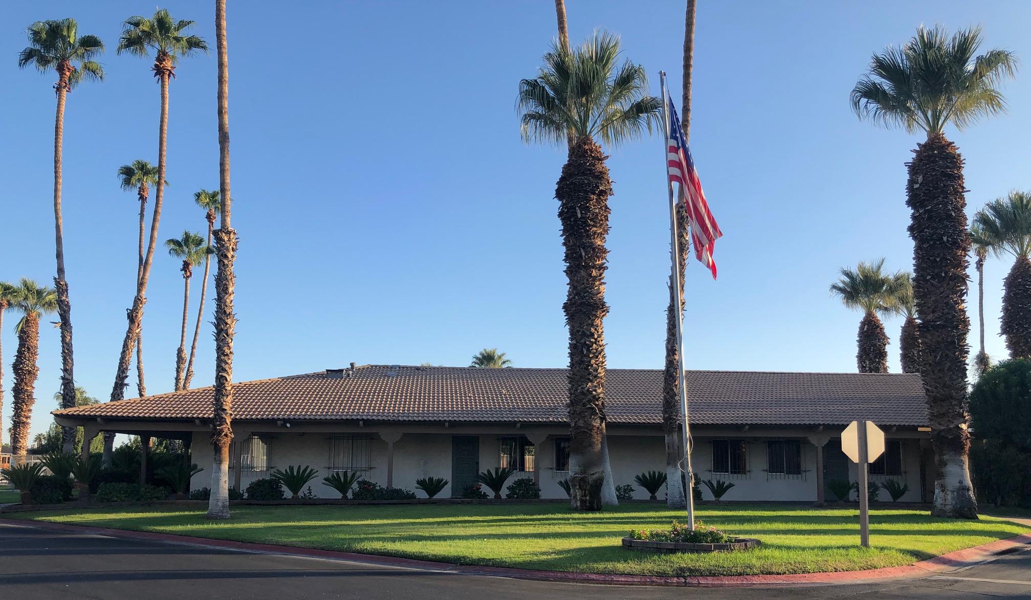 81351 Ave 46, Unit 38 Indio, CA 92201 - Photo 10 of 14 a front view of a house with a garden and plants