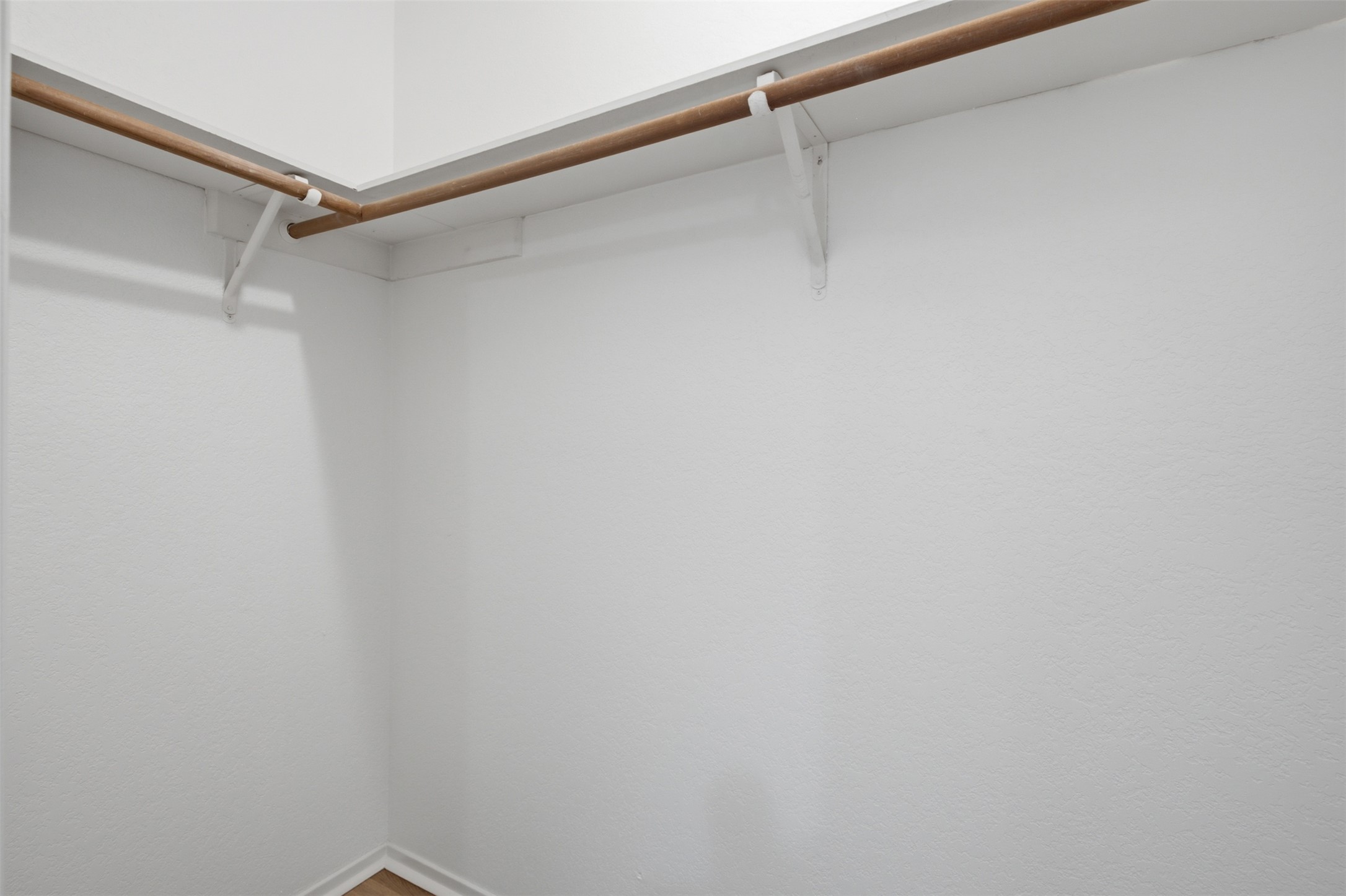 11611 Rustic Rock Drive, Unit B Austin, TX 78750 - Photo 19 of 30 Ample hanging space and shelving await in this freshly appointed closet