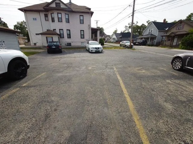 a car parked in front of a house