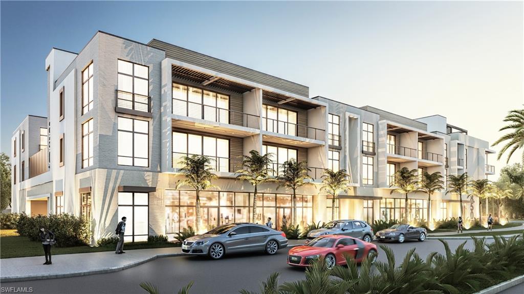 850 Central Avenue, Unit 209 Naples, FL 34102 - Photo 1 of 11 a view of a cars park in front of a brick building