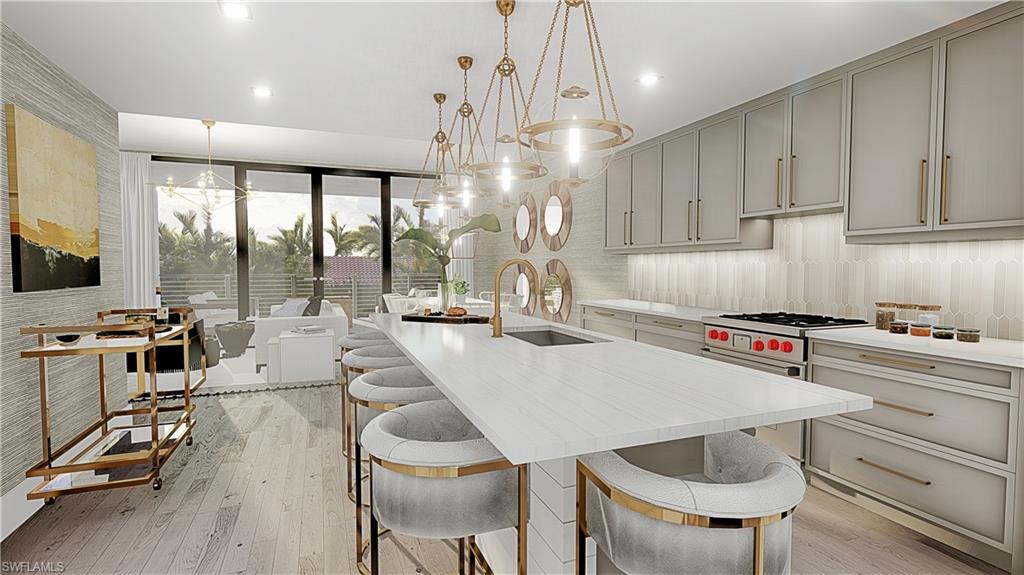 850 Central Avenue, Unit 209 Naples, FL 34102 - Photo 4 of 11 a kitchen with a table chairs stove and cabinets