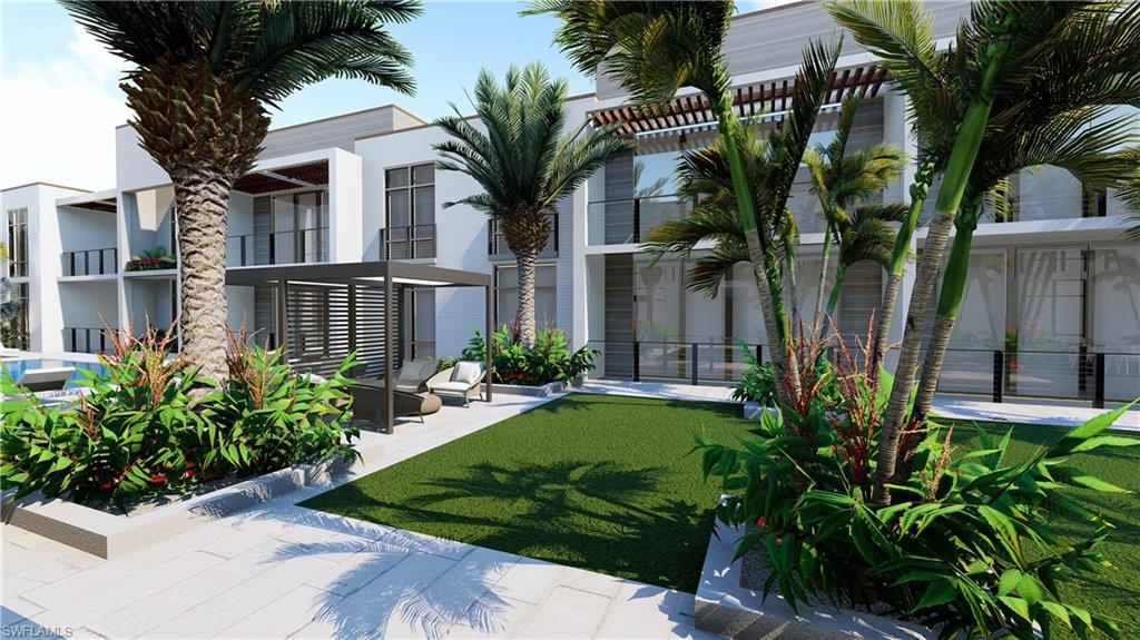 850 Central Avenue, Unit 209 Naples, FL 34102 - Photo 6 of 11 a view of a yard in front of house