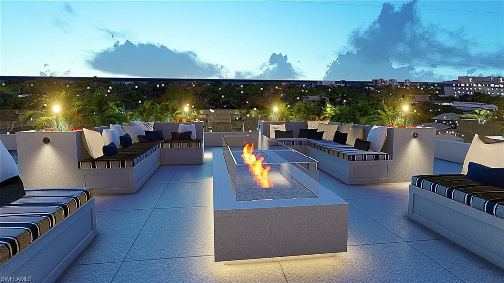 850 Central Avenue, Unit 209 Naples, FL 34102 - Photo 8 of 11 an outdoor living room with patio furniture and city view