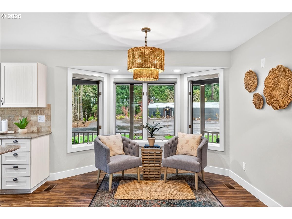 29009 Southwest Burkhalter Road Hillsboro, OR 97123 - Photo 14 of 48 a living room with furniture and wooden floor