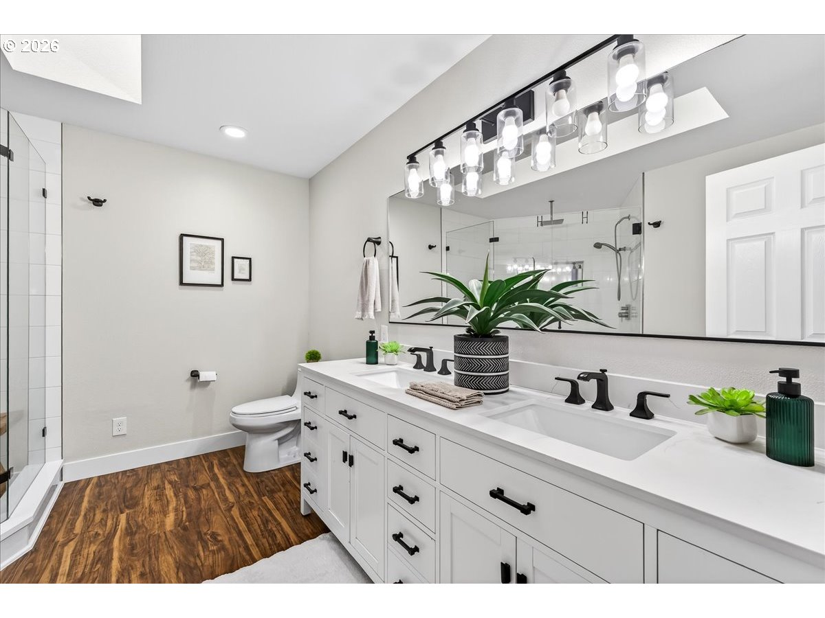 29009 Southwest Burkhalter Road Hillsboro, OR 97123 - Photo 17 of 48 a bathroom with a sink and a mirror