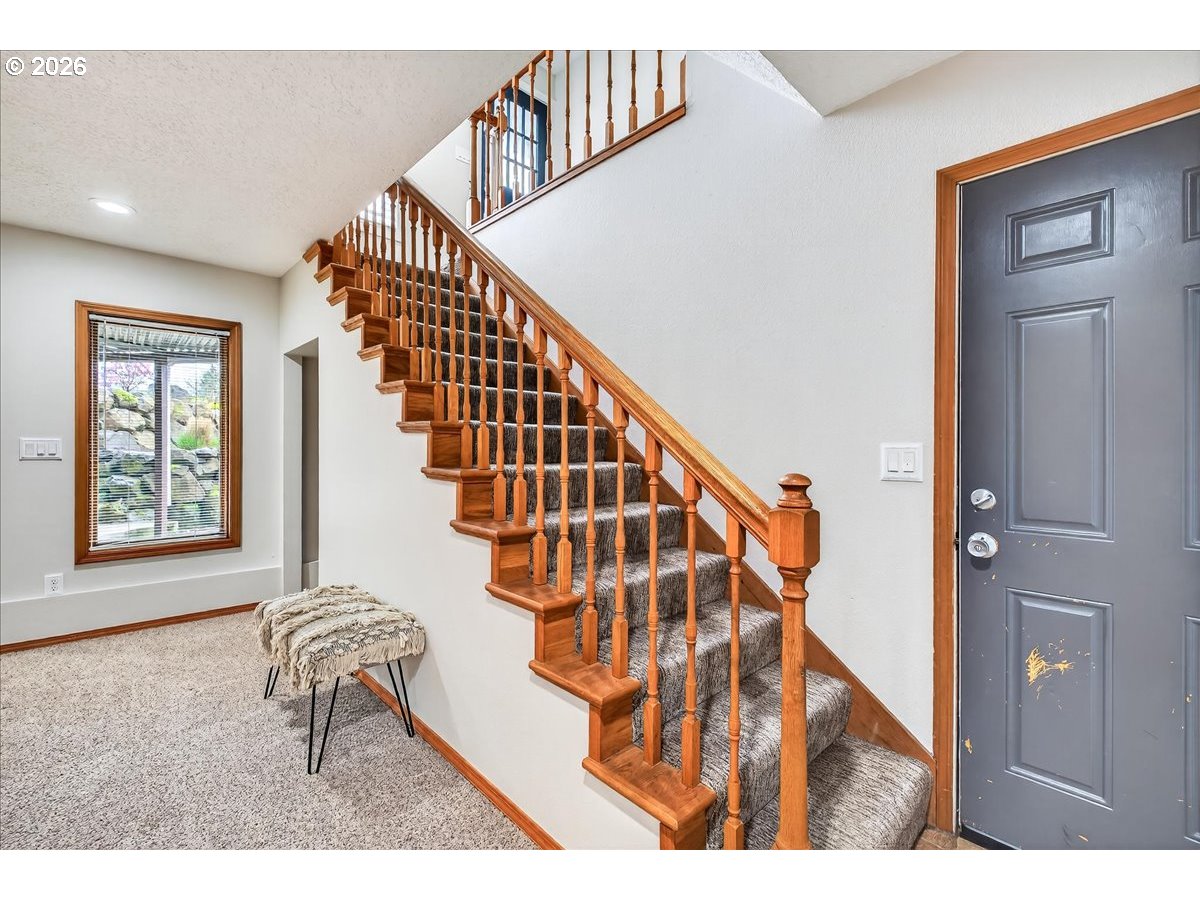 29009 Southwest Burkhalter Road Hillsboro, OR 97123 - Photo 22 of 48 a view of entryway and hall with wooden floor