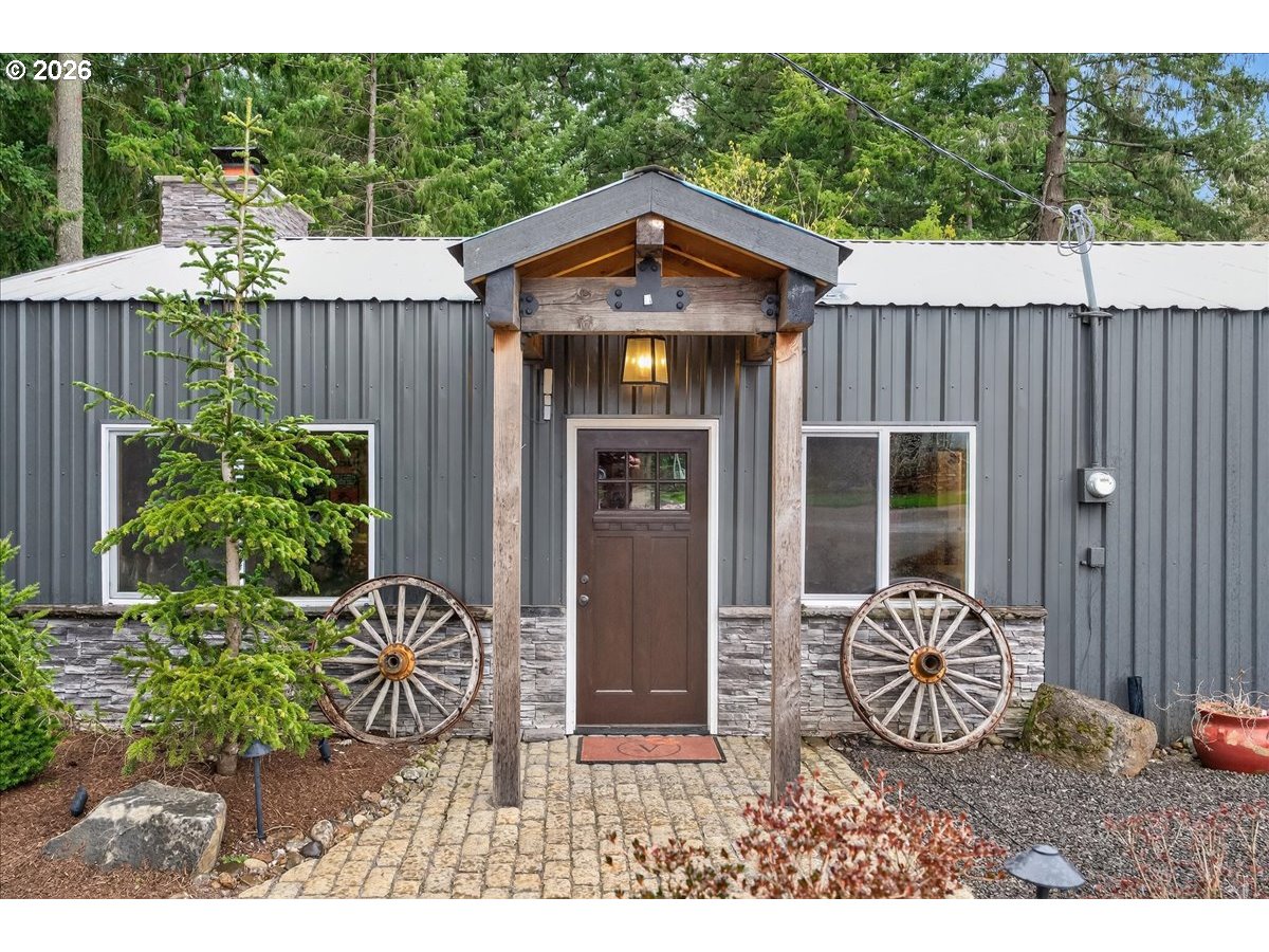 29009 Southwest Burkhalter Road Hillsboro, OR 97123 - Photo 28 of 48 a front view of a house with garden