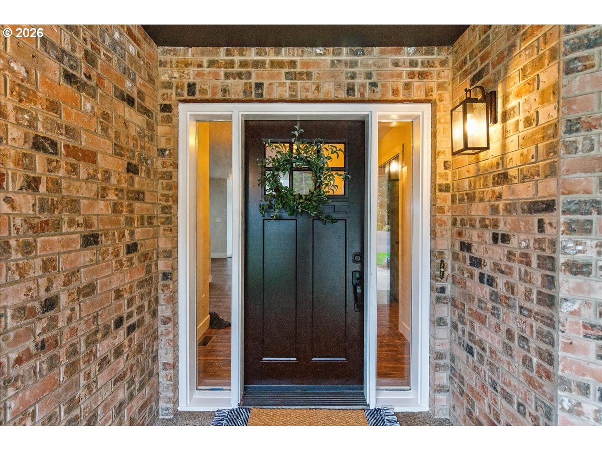 29009 Southwest Burkhalter Road Hillsboro, OR 97123 - Photo 3 of 48 a view of a wooden door