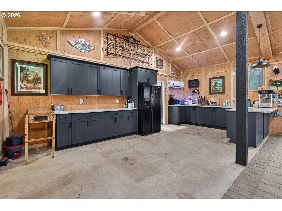 29009 Southwest Burkhalter Road Hillsboro, OR 97123 - Photo 35 of 48 a view of a kitchen with a sink and cabinets