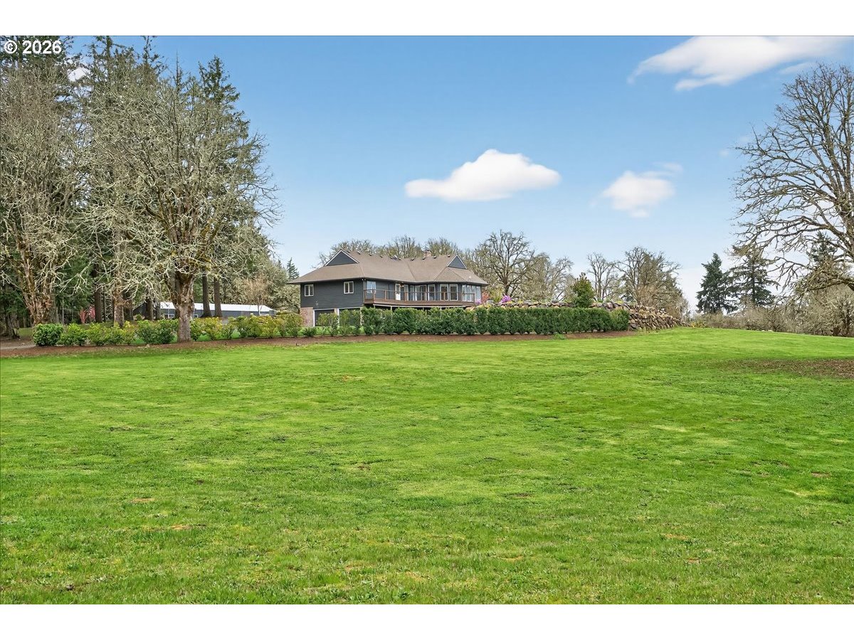 29009 Southwest Burkhalter Road Hillsboro, OR 97123 - Photo 43 of 48 a view of a house with a big yard