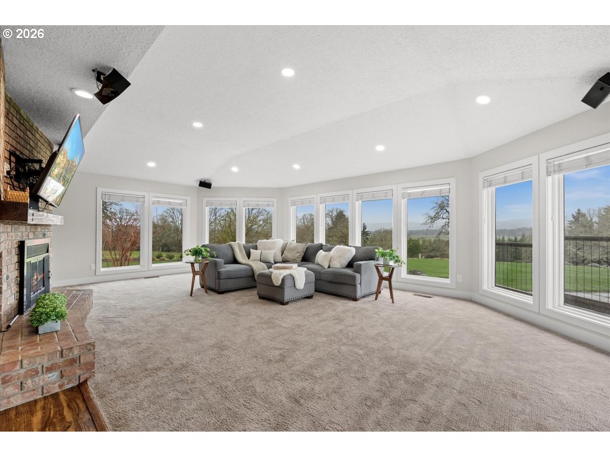 29009 Southwest Burkhalter Road Hillsboro, OR 97123 - Photo 7 of 48 a living room with furniture and a large window
