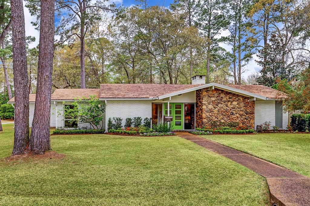 Super cute mid-century mod vibe on a great corner lot in desirable Hilshire Village.