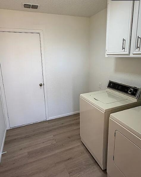 5232 95th Street Lubbock, TX 79424 - Photo 16 of 35 a utility room with dryer and washer