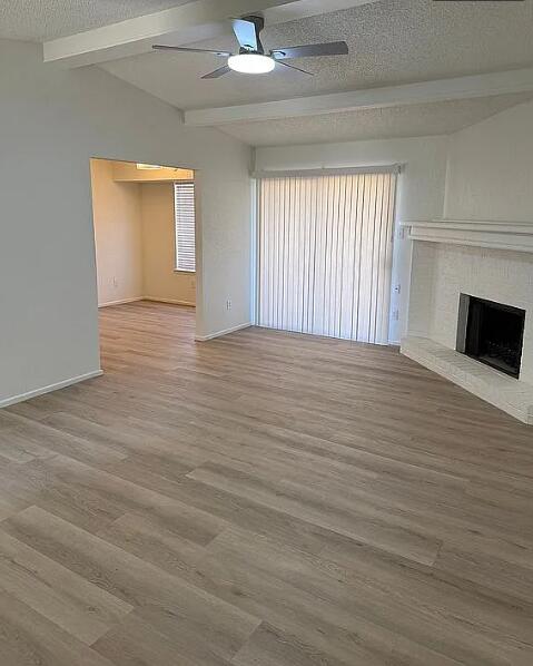 5232 95th Street Lubbock, TX 79424 - Photo 19 of 35 a view of an empty room with wooden floor and a window